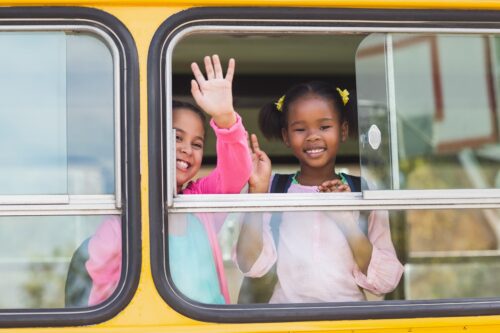 children students on a school bus